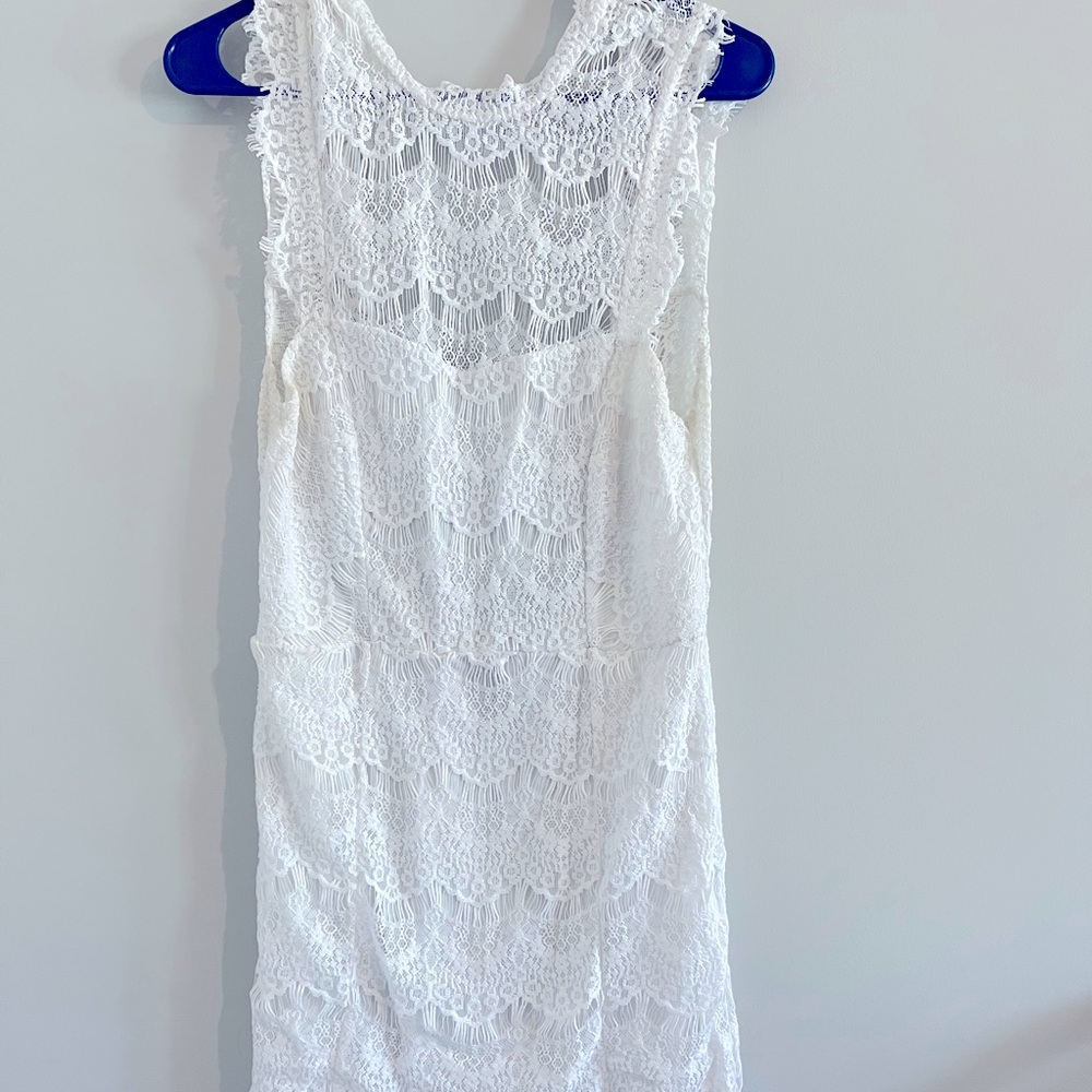 High neck white lace dress. Great for rehearsal dinner or bachelorette party!